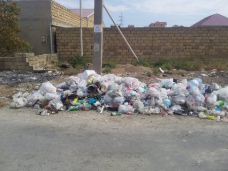Abşeron rayonu zibil poliqonuna çevrilir:məsul şəxslər isə ötü-ötür oyunu oynayır-FOTOLAR